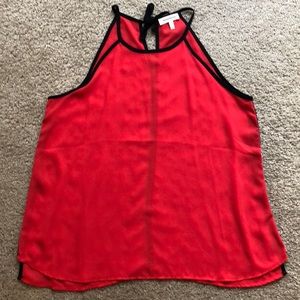 Red sleeveless top
